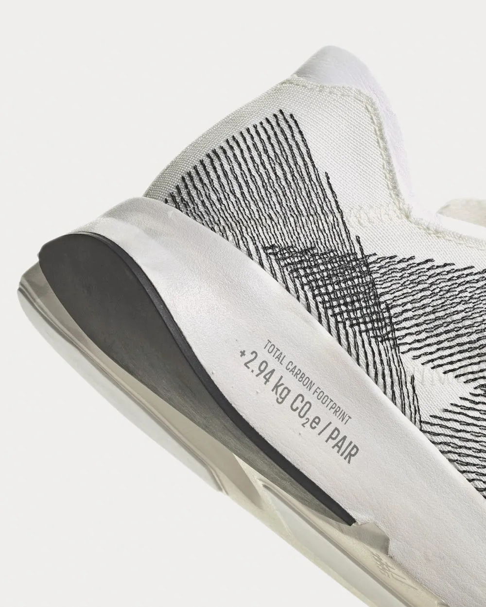 Adizero 2.94 KG CO2E Non Dyed / Cloud White / Carbon Running Shoes